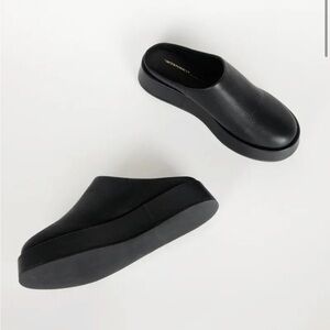 Intentionally Blank black Risen platform clogs